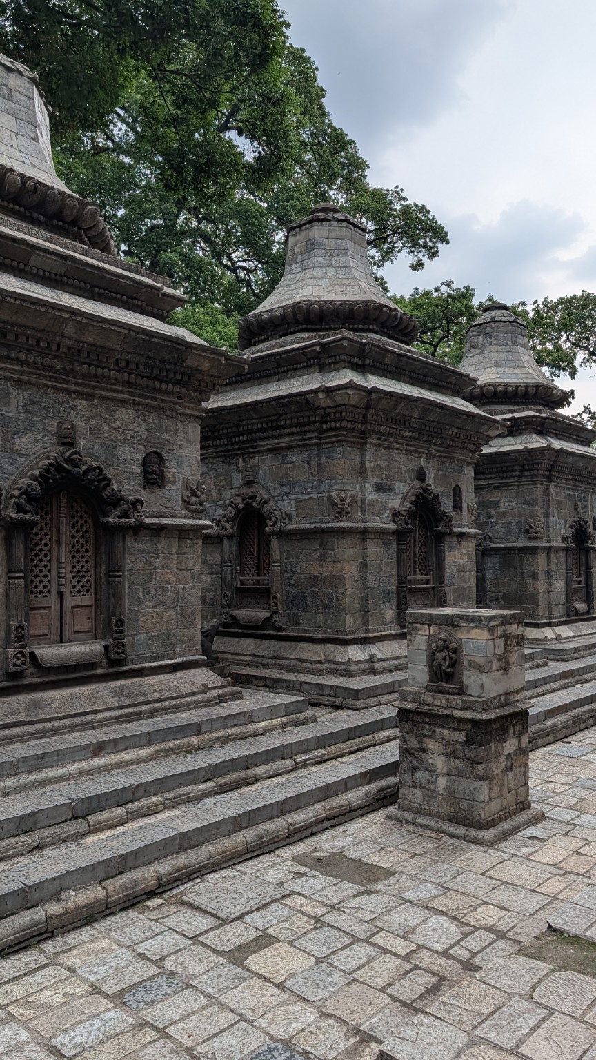 Historic stone temples in a green setting
